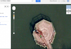 Two men dragging bleeding body on Google maps